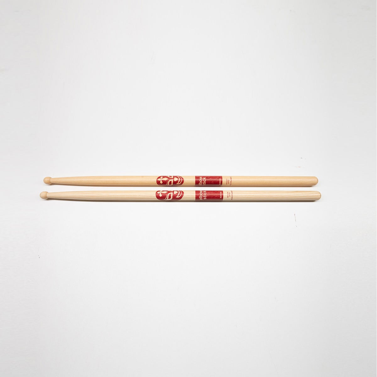 elbow stick ROUGE drum sticks.